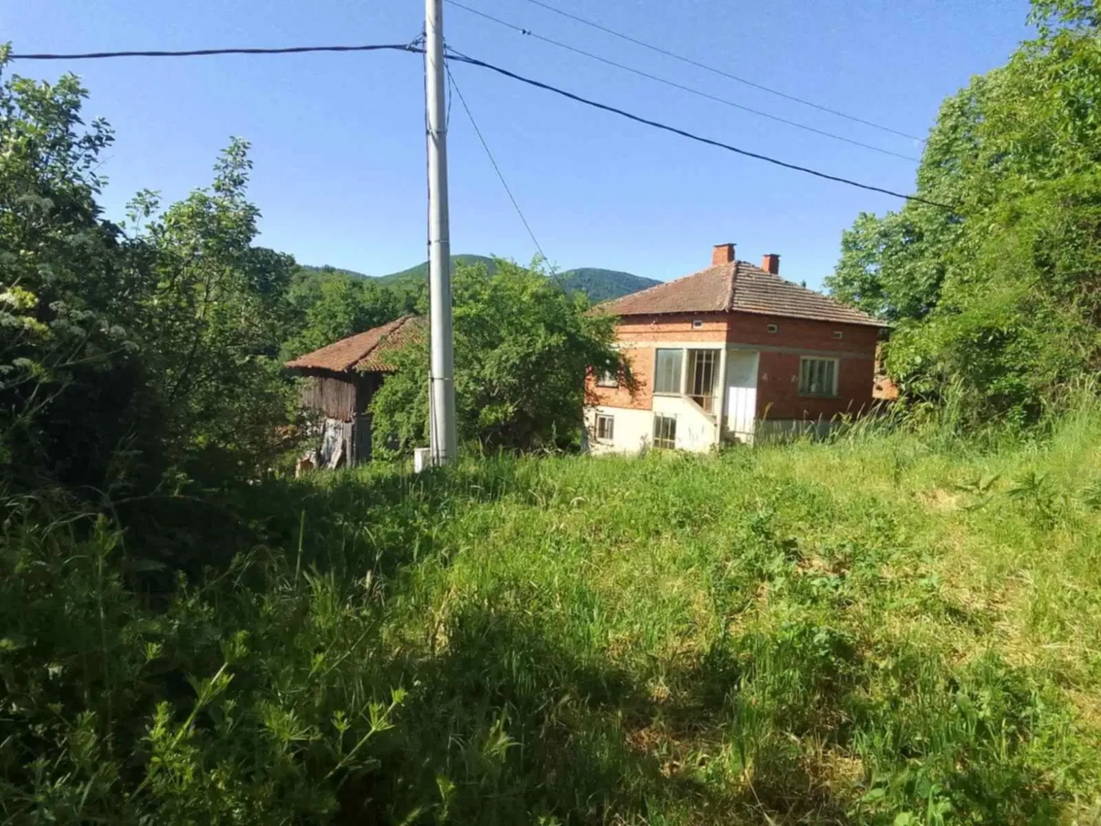 Woning aan de rivier met bijgebouw en 1.100 m² grond in Podgore, Vidin - Bulgarije