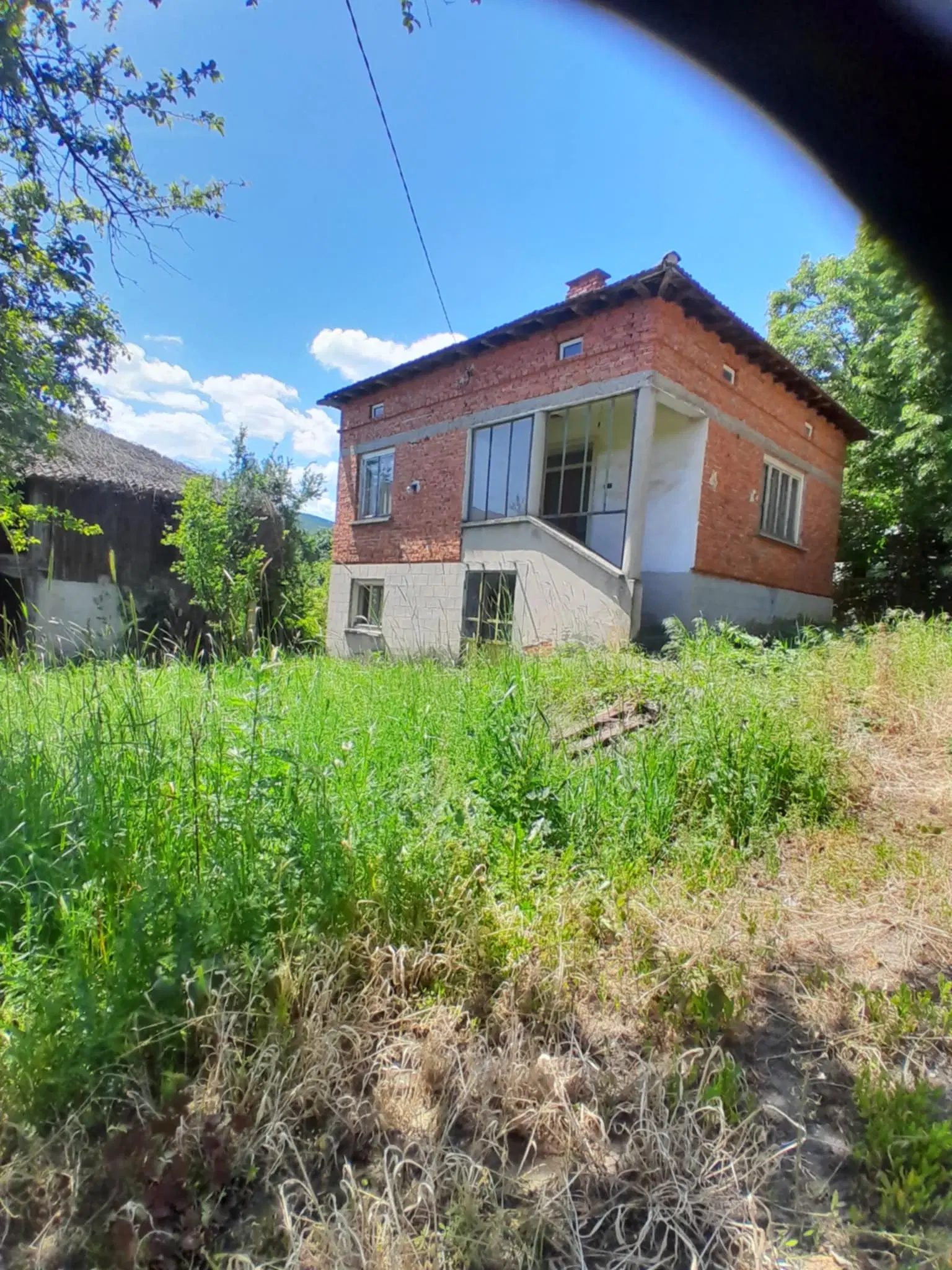 Woning aan de rivier met bijgebouw en 1.100 m² grond in Podgore, Vidin - Bulgarije