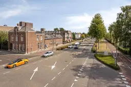 Waalwijk, Noorder Parallelweg 1 en 3 en Stationsstraat 129