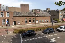 Waalwijk, Noorder Parallelweg 1 en 3 en Stationsstraat 129