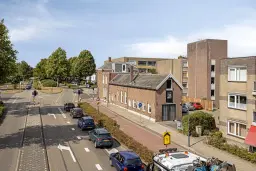 Waalwijk, Noorder Parallelweg 1 en 3 en Stationsstraat 129