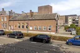 Waalwijk, Noorder Parallelweg 1 en 3 en Stationsstraat 129