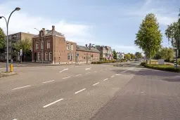 Waalwijk, Noorder Parallelweg 1 en 3 en Stationsstraat 129