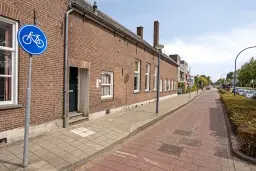 Waalwijk, Noorder Parallelweg 1 en 3 en Stationsstraat 129