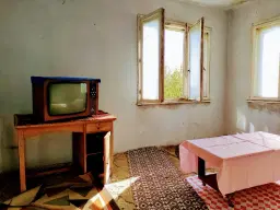 Tweelaags huis met een perceel van 1.100 m² en landbouwgrond van 6.494 m² in Rakovitsa - Bulgarije